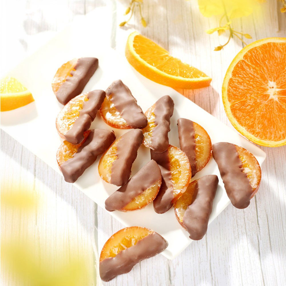 Schokolierte Orangenscheiben Vollmilch Schokolierte Orangenscheiben Vollmilch von BERLINER KAFFEERÖSTEREI GIEST & COMPAGNON