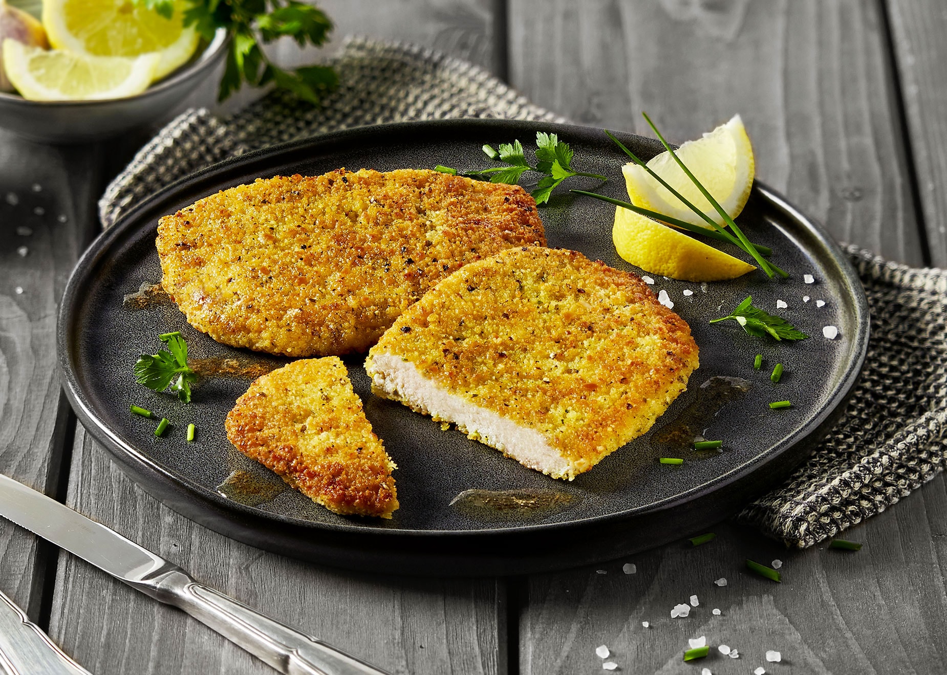 Schnitzel in Kräuter-Zitronenpanade mit 8% Flüssigwürzung Schnitzel in Kräuter-Zitronenpanade mit 8% Flüssigwürzung von Bofrost