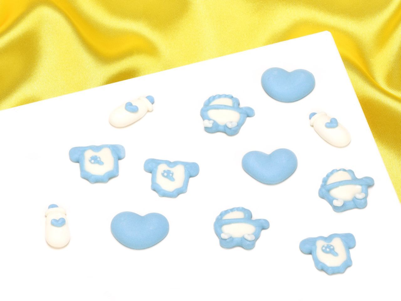 Zuckerdekor Baby babyblau 28mm 12 Stück Zuckerdekor Baby babyblau 28mm 12 Stück von Culpitt