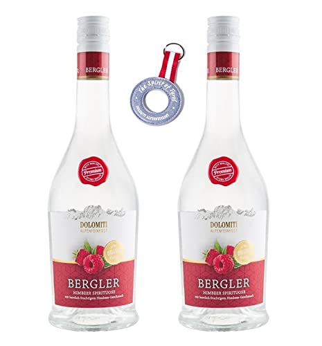 Dolomiti Bergler Himbeer (2 x 0.7 l)│2er Set + cooler Filz-Schlüsselanhänger gratis │Wunderbarer Himbeer Schnaps aus den Alpen │Geschmacksexplosion │ Echt Himbeerig │Bergler aus besten Himbeeren von DOLOMITI ALPENFEINKOST