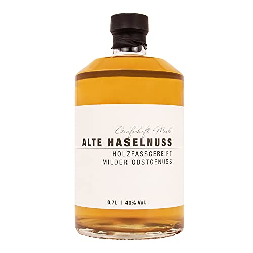 Grafschaft Mark Alte Haselnuss Schnaps 1 x 0,7 L | 40% vol. Alkohol | milder Obstbrand holzfassgelagert | Spezialitäten aus unserer Brennerei | edle Aromen von Nuss als Obstler | ideal als Geschenk von DeCavo