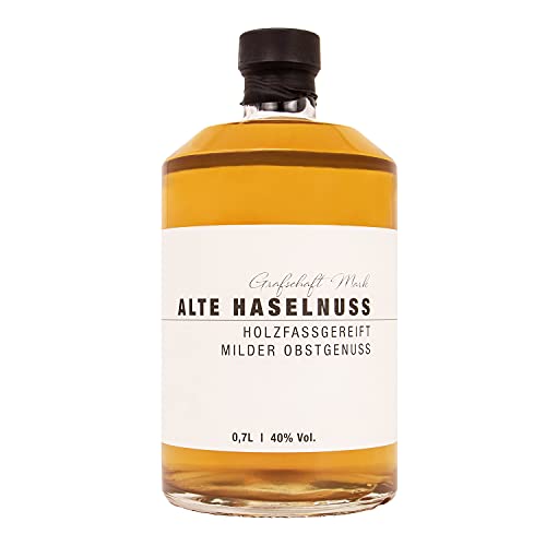 Grafschaft Mark Alte Haselnuss Schnaps 1 x 0,7 L | 40% vol. Alkohol | milder Obstbrand holzfassgelagert | Spezialitäten aus unserer Brennerei | edle Aromen von Nuss als Obstler | ideal als Geschenk von DeCavo