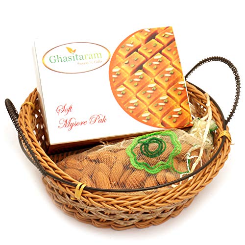 Ghasitaram Gifts Indian Sweets - Diwali Gifts Diwali Hamper Sweet Hampers - Small Cane Basket with Mysore Pak and Almonds Pouch von Ghasitaram Gifts