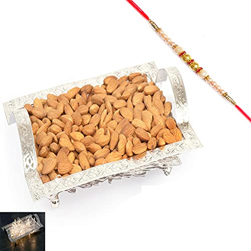 Ghasitaram Gifts Rakhi Gifts for Brothers Rakhi Dryfruits- Silver Mesh Almonds Tray with Pearl Rakhi von Ghasitaram Gifts