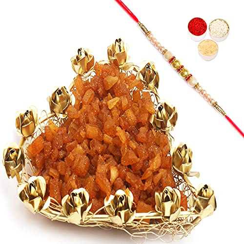 Ghasitaram Gifts Rakhi Gifts for Brothers Rakhi Dyfruits- Mesh Heart Masala Mango Tray with Pearl Rakhi von Ghasitaram Gifts