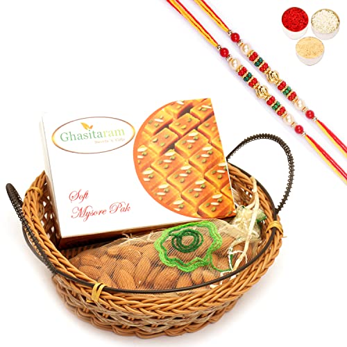 Ghasitaram Gifts Rakhi Gifts for Brothers Rakhi Sweets - Small Cane Basket with Mysore Pak and Almonds Pouch with 2 Beads Rakhis von Ghasitaram Gifts