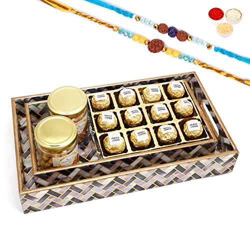 Ghasitaram Gifts Rakhi Gifts for Brothers Set of 2 Printed Blue Trays of Channa Laddoos, Roasted Cashews and Almonds Jars with 2 Blue Rudraksh Rakhis Ghasitaram Gifts Rakhi Gifts for Brothers Set of 2 Printed Blue Trays of Channa Laddoos, Roasted Cashews and Almonds Jars with 2 Blue Rudraksh Rakhis von Ghasitaram Gifts