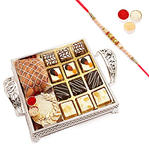 Ghasitaram Gifts Rakhi Gifts for Brothers Silver Tray with Assorted Choco Dryfruit Bites, Almonds and Mini Pooja Thali with Pearl Rakhi von Ghasitaram Gifts