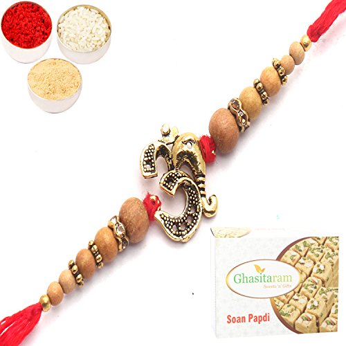 Rakhi for Brother Rakhis Online- Om Ganesha Bonded with Beads of Love Rakhi with 400 GMS of Soan Papdi Rakhi for Brother Rakhis Online- Om Ganesha Bonded with Beads of Love Rakhi with 400 GMS of Soan Papdi von Ghasitaram Gifts