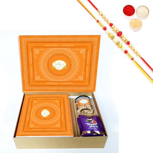 Ghasitaram Gifts Jaiccha Rakhi Gifts for Brothers-Orange Hamper Box with Sugarfree Kaju Katli, Sugarfree Bites and Wheat Puffs with 2 Rakhis Ghasitaram Gifts Jaiccha Rakhi Gifts for Brothers-Orange Hamper Box with Sugarfree Kaju Katli, Sugarfree Bites and Wheat Puffs with 2 Rakhis von Jaiccha