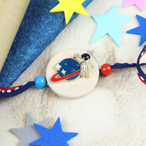 Ghasitaram Gifts Jaiccha Rakhi for Brother Rakhis Online KR24-040- Metal Space Kids Rakhi Ghasitaram Gifts Jaiccha Rakhi for Brother Rakhis Online KR24-040- Metal Space Kids Rakhi von Jaiccha