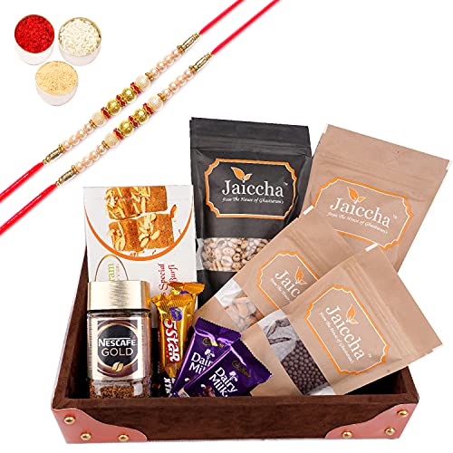 Jaiccha Ghasitaram Rakhi Gifts for Brothers Korno Tray of 10 Goodies with Besan Barfi and with 2 Pearl Rakhis von Jaiccha