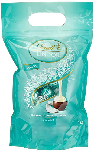 Lindt Lindor Beutel Cocos 1 kg, gefüllt mit Lindor Kugeln aus feiner Milchschokolade und einer zartschmelzenden Kokos Füllung von Lindt & Sprüngli
