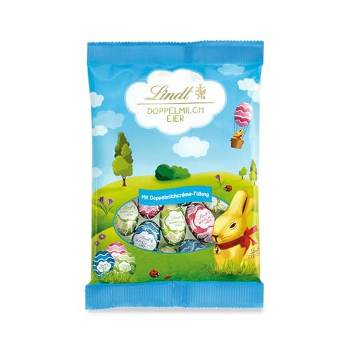 Lindt Schokolade Doppelmilch Eier | 4 x 100 g Beutel | Feinste Vollmilch Eier mit Doppelmilchcrème Füllung | Oster Schokolade für Kinder | Schokoladengeschenk | Ostereier von Lindt & Sprüngli
