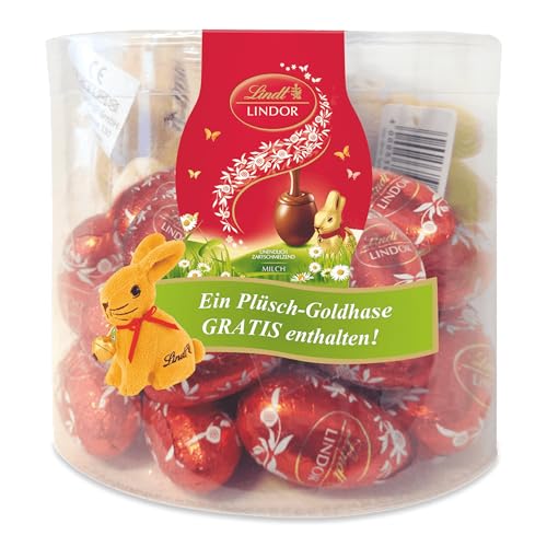 Lindt Schokolade LINDOR-Eier Vollmilch | 450 g Paket | ca. 25 x LINDOR Vollmilch-Schokolade mit zartschmelzender Füllung und ein kuschliger Plüsch-Osterhase | Osterschokolade | Schokoladengeschenk von Lindt & Sprüngli