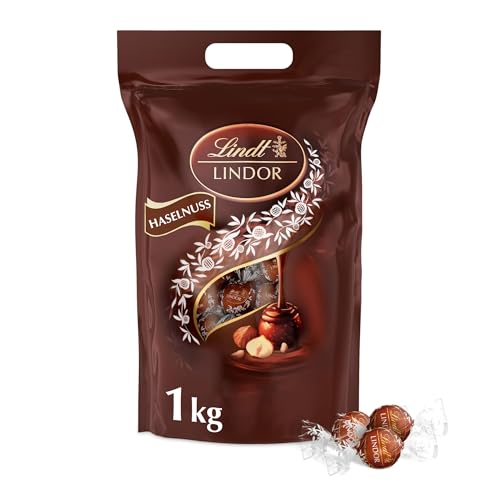 Lindt LINDOR, Haselnuss-Milch Schokolade Kugel Beutel, 1 kg Beutel wiederverschließbar, ca. 80 Kugeln, Großpackung, Pralinen-Geschenk, Schokoladengeschenk Lindt LINDOR, Haselnuss-Milch Schokolade Kugel Beutel, 1 kg Beutel wiederverschließbar, ca. 80 Kugeln, Großpackung, Pralinen-Geschenk, Schokoladengeschenk von Lindt