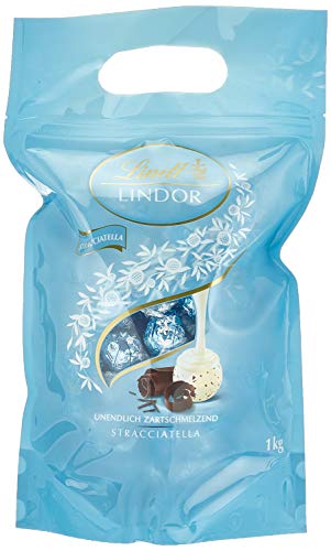 Lindt Lindor Beutel Stracciatella 1 kg, gefüllt mit Lindor Kugeln aus weißer LINDT Chocolade mit Kakaosplittern und einer zartschmelzenden Füllung von Lindt