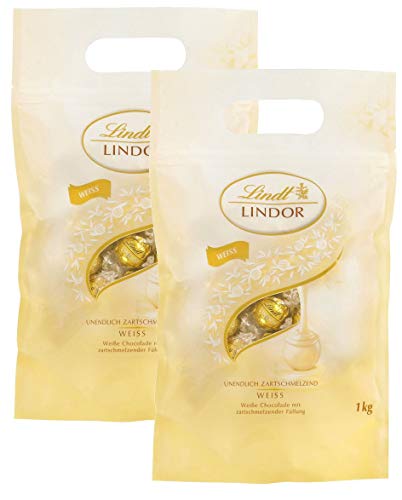 Lindt LINDOR Schokoladen Kugeln weiß | 1 kg Beutel, wiederverschließbar | ca. 80 Schokoladen Kugeln weiße Schokolade mit zartschmelzender Füllung | Großpackung, Pralinen-Geschenk (2 x 1 kg) von Lindt