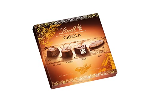 Lindt Schokolade Creola Pralinen | 165g | Pralinés-Schachtel mit 15 Pralinen in 4 köstlichen Sorten ohne Alkohol mit Kakao Nibs aus 100 % Edelkakao | Pralinengeschenk | Schokoladengeschenk Lindt Schokolade Creola Pralinen | 165g | Pralinés-Schachtel mit 15 Pralinen in 4 köstlichen Sorten ohne Alkohol mit Kakao Nibs aus 100 % Edelkakao | Pralinengeschenk | Schokoladengeschenk von Lindt