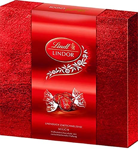 Lindt Schokolade LINDOR Präsent Box Milch | 187 g | Ca. 15 Kugeln Vollmilchschokolade mit zartschmelzender Füllung in festlichem Design | Pralinengeschenk | Schokoladengeschenk von Lindt