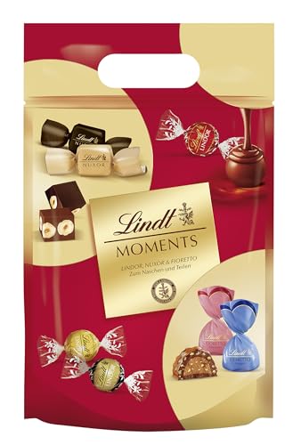 Lindt Schokolade Moments XL Beutel | 750g | Raffinierte Mischung aus feinsten LINDOR Kugeln, knackig-nussiger NUXOR Gianduja-Schokolade und knusprigen FIORETTO Pralinés | Schokoladen-Geschenk Lindt Schokolade Moments XL Beutel | 750g | Raffinierte Mischung aus feinsten LINDOR Kugeln, knackig-nussiger NUXOR Gianduja-Schokolade und knusprigen FIORETTO Pralinés | Schokoladen-Geschenk von Lindt