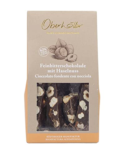 Oberhöller Feinbitter Schokolade mit Haselnuss, 100 g - Bruchschokolade 100% gentechnikfrei, ohne Konservierungsmittel, Bean-to-Bar, Qualitätsprodukt Made in Südtirol Oberhöller Feinbitter Schokolade mit Haselnuss, 100 g - Bruchschokolade 100% gentechnikfrei, ohne Konservierungsmittel, Bean-to-Bar, Qualitätsprodukt Made in Südtirol von Oberhöller Finest Gourmet Chocolate