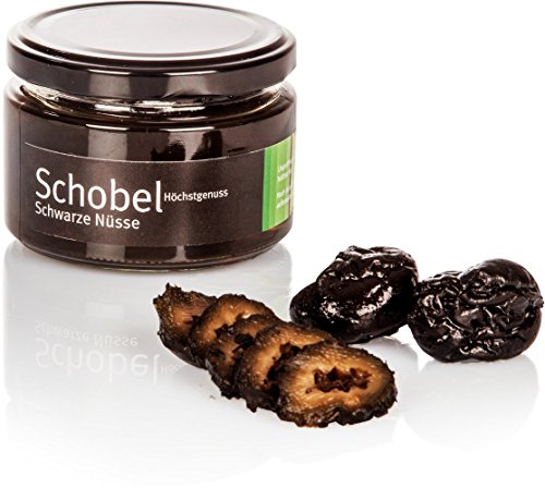 Eingelegte Schwarze Nüsse - Walnüsse nach altem Rezept - in einen süßen Kräutersirup eingelegte Schwarze Nüsse - 280g von Schobel Höchstgenuss